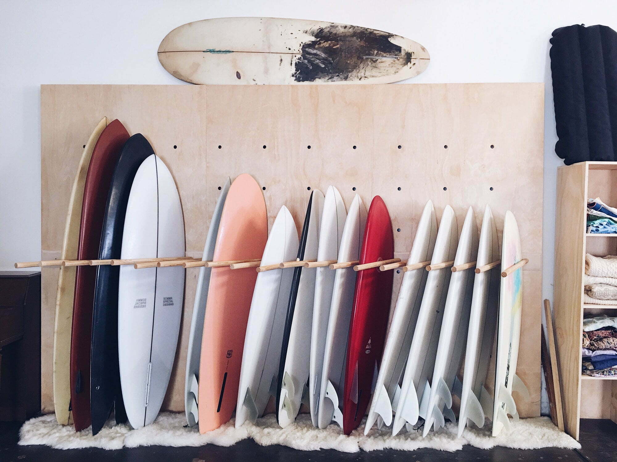 Surfboards lined up for rent in surf cafe shop Surfboards lined up for rent in surf cafe shop